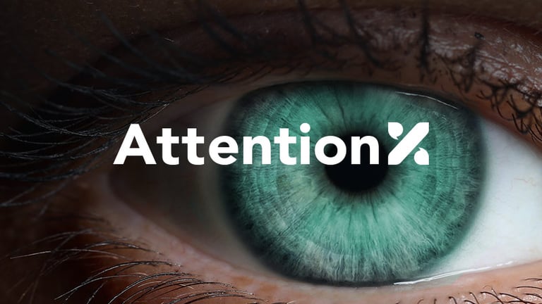 A green eye with 'AttentionX' written over it