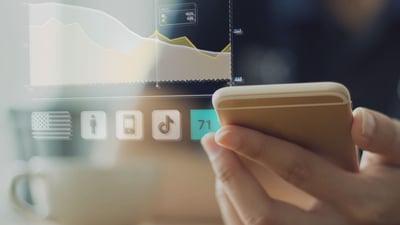 Person viewing phone with a chart showing their attention and emotion