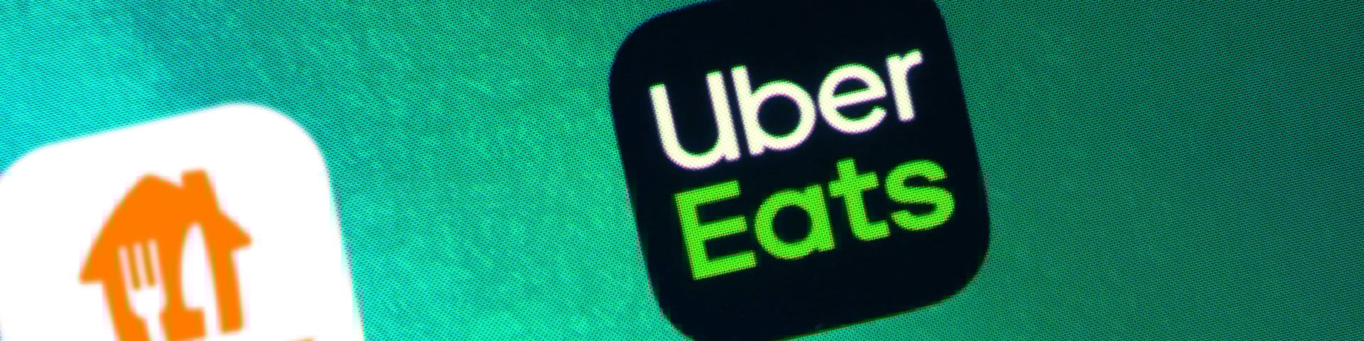 Just Eat and Uber Eat app logos