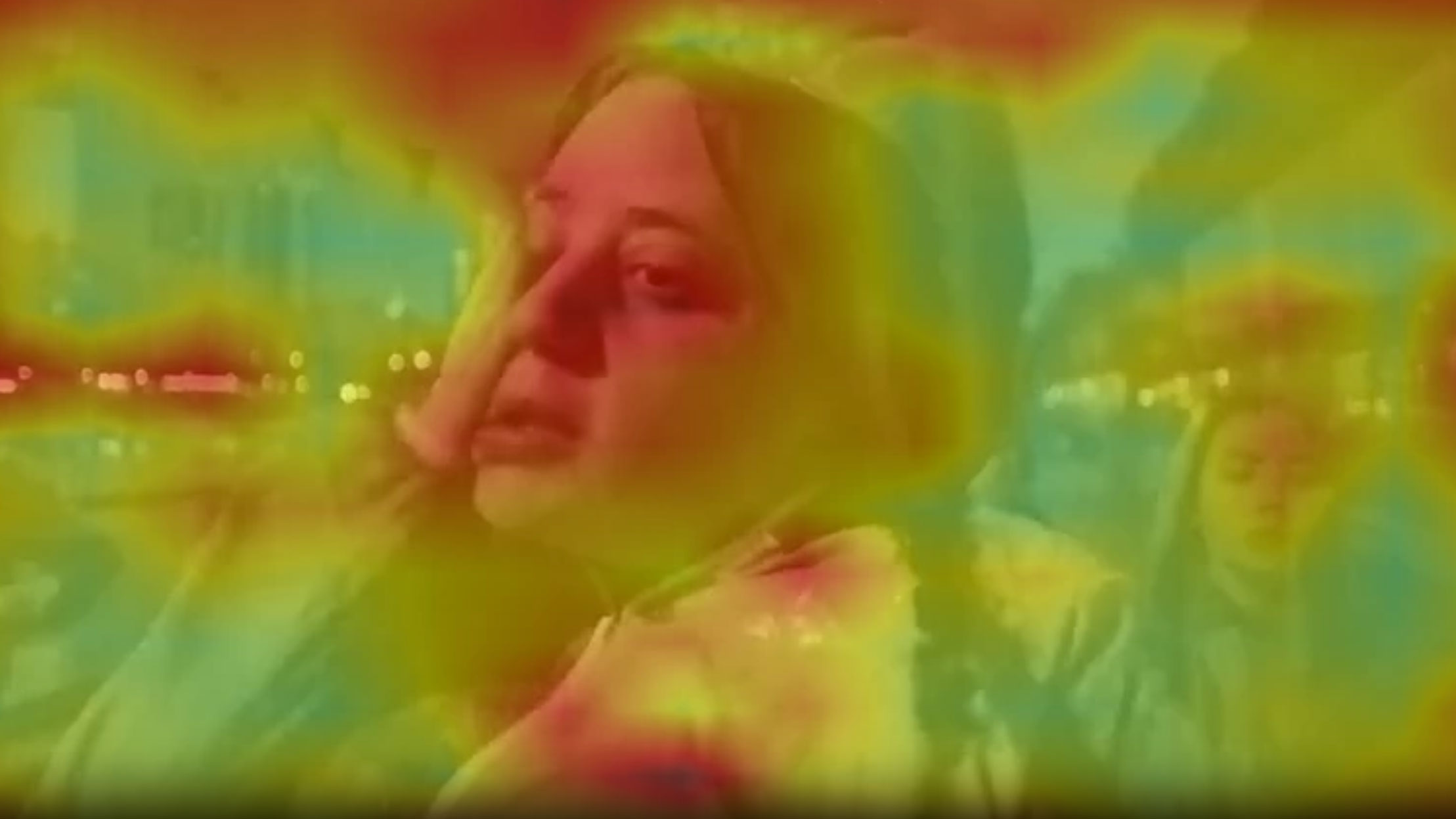 Woman wipes her wet face 